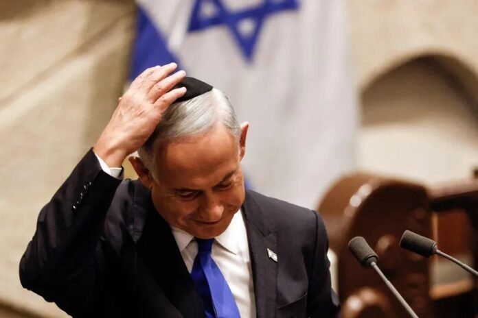 101614205-israeli-prime-minister-designate-benjamin-netanyahu-adjusts-his-skull-cap-after-speaki.jpg