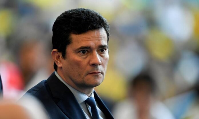 83568470_Brazils-Minister-of-Justice-Sergio-Moro-waits-for-the-start-of-the-Copa-America-footba.jpg